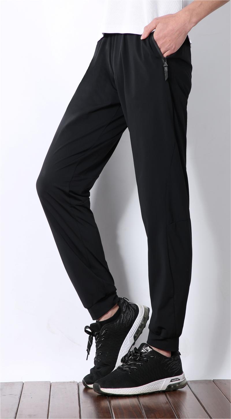 792370# Nylon tapered trousers